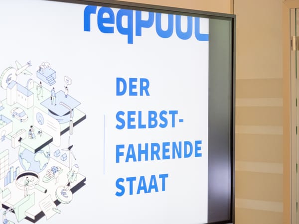 Screen showing the title slide “The Self-Driving State” with an illustration of a digital city